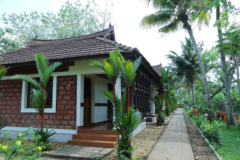 Guest cottages in traditional Kerala style